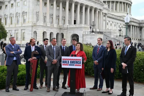 Rep. Maloy at podium at Build America Caucus Launch Event